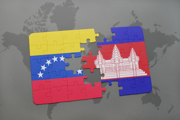 puzzle with the national flag of venezuela and cambodia on a world map