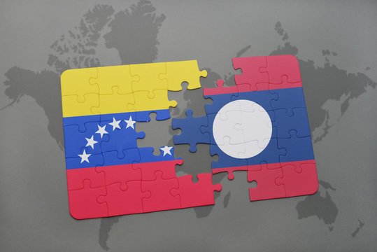 puzzle with the national flag of venezuela and laos on a world map