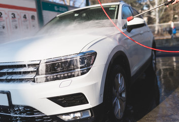 Car washing. Cleaning Car Using High Pressure Water. 