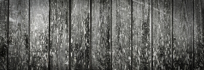 Fototapeta na wymiar The old wooden walls, black and white Vintage background