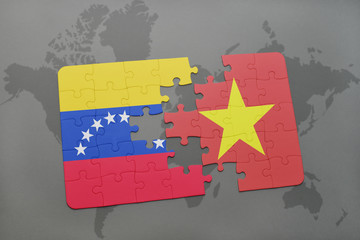 puzzle with the national flag of venezuela and vietnam on a world map