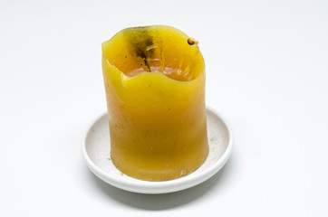 Dirty candle on white background
