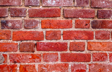 The texture of the brick wall of red brick. Old building.