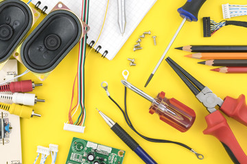 Components, records and tools on the table of a researcher are related to applied science and...