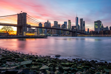 Fototapeta na wymiar Brooklyn Bridge and Downtown Manhattan view at sunset