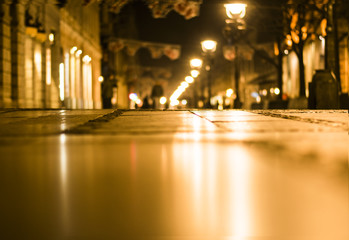 Fototapeta na wymiar Blurred background. Blurred night a city street.