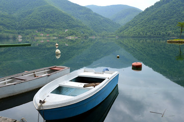 Natural landscape with lake and boat