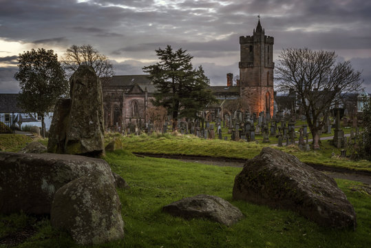 Spooky Castle graveyard at dusk