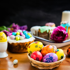 Obraz na płótnie Canvas Festive Easter Table with Easter Cakes and Eggs