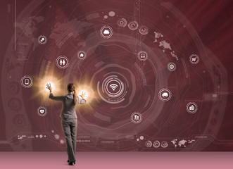 woman operating futuristic graphical user interface