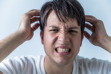 young man have a headache