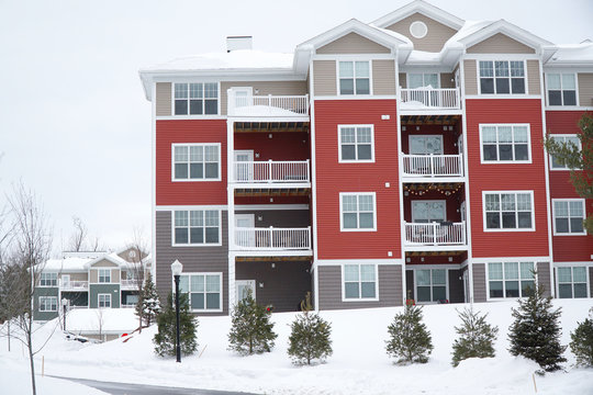 Modern Apartment Building After Winter Snow Storm