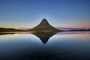 Reflections of Kirkjufell during sunset with clear sky. one of the spot place at iceland