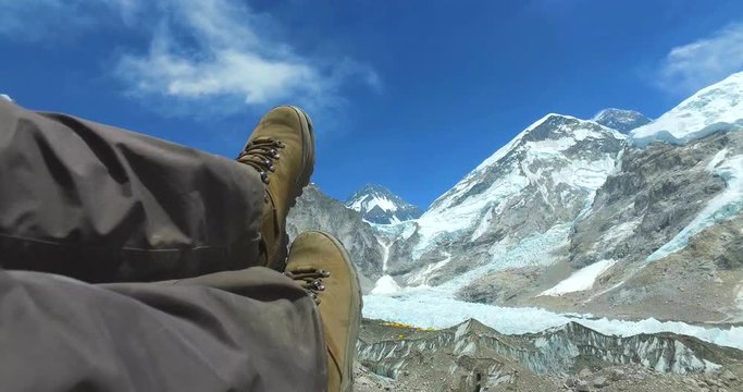 tourist background Feet on the Khumbu Glacier and the base camp of Mount Everest - Nepal, Himalaya. 