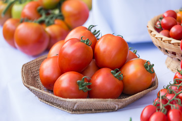 group of ripe tomato in the basket