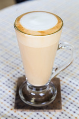 cup of latte coffee on the table