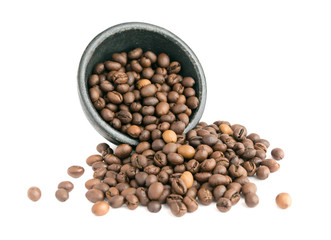 Roasted Coffee Beans Scattered out of the Black Bowl Isolated