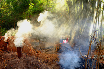 Fototapeta na wymiar Background of rural charcoal making in thai traditional