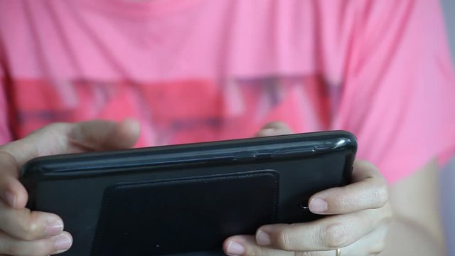 Asian Woman using tablet