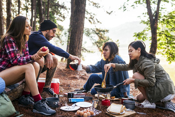 Friends Camping Eating Food Concept