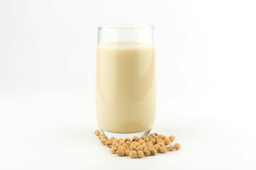  soy milk with soy beans on white background