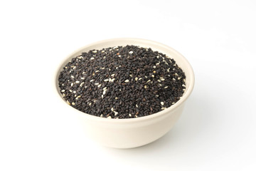 black sesame seeds isolated on white background