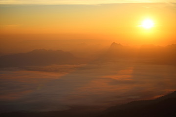 Fototapeta na wymiar Sunrise and mist at Phu Kradung National Park, Thailand