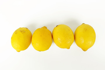 fresh lemon whole and slice with lemon leaf