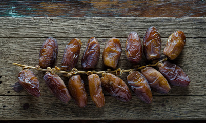 date palm ,Date fruits on wood
