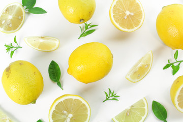 fresh lemon whole and slice with lemon leaf