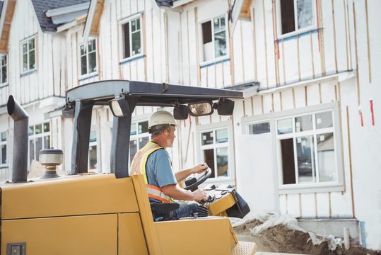 Man operating bulldozer