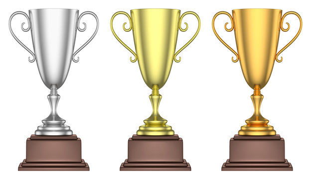 Golden, silver and bronze trophy cups isolated