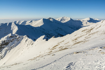 Fototapeta na wymiar Ridge covered with snow.