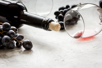 Obraz premium Wine set for restaurant with bottle on texture background