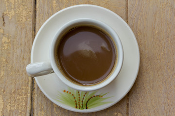Coffee cup on wooden table