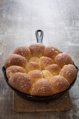 Sweet bread baked in a cast iron pan. 