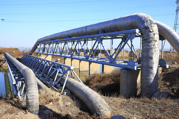 Oil field scene, oil pipelines and facilities