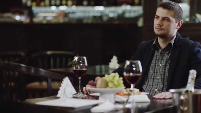 blondie beauty coming to boyfriend in restaurant
