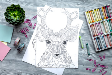 coloring picture for adults on wooden background top view