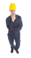 Young worker with yellow helmet isolated on white background