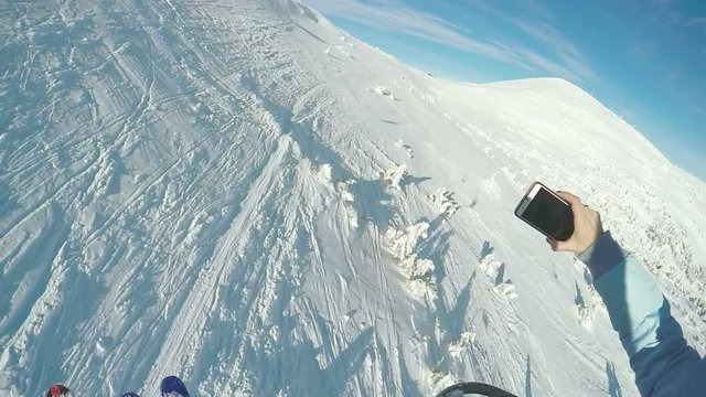 Shooting smartphone on the ski lift