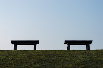 Bench on top of the mountain view background