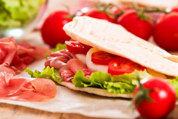 Piadina with ham and lettuce. 