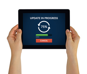 Hands holding digital tablet computer with update concept on screen. Isolated on white. All screen content is designed by me