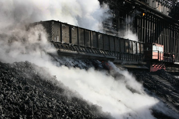 Hot quenched coke being delivered from the quench car to the holding warf for delivery to blast furnaces.