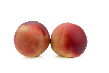 Peaches. Ripe fresh peaches isolated on white background.