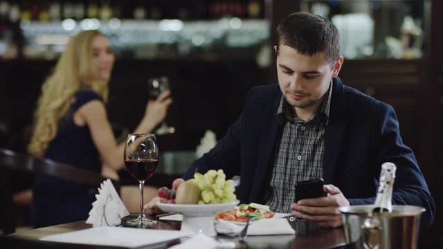 beauty flirting with man in restaurant
