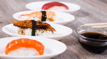 four kinds Nigirisushi on oval saucers