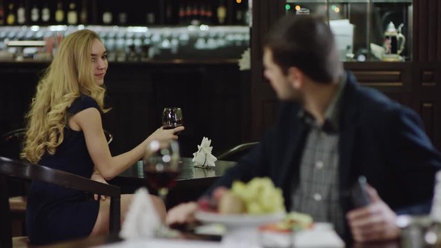 flirting man and woman in restaurant