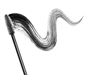 Stroke of black mascara with applicator brush close-up, isolated on white background - obrazy, fototapety, plakaty